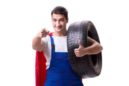 Superhero man with tyre isolated white backgroundの写真素材