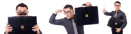 Young man holding briefcase isolated on whiteの写真素材