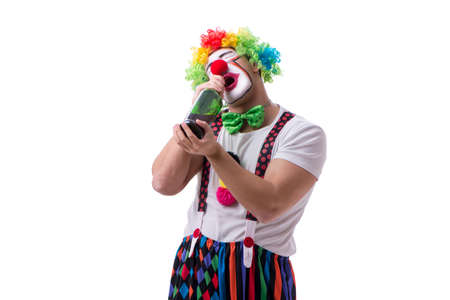 Funny clown with a bottle isolated on white backgroundの写真素材