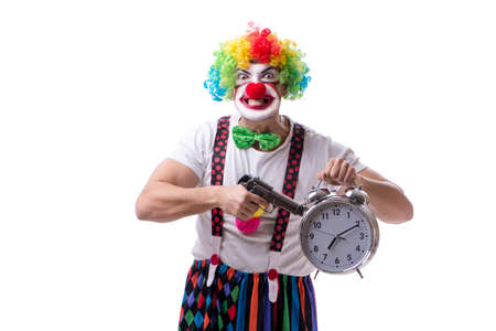 Funny clown with an alarm clock isolated on white backgroundの写真素材