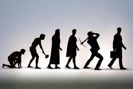 Progression of man mankind from ancient to modernの写真素材