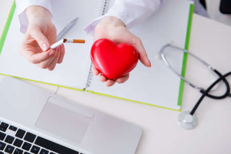 Antismoking concept wih heart in medical conceptの写真素材