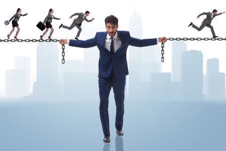 Businessman providing help to colleaguesの写真素材