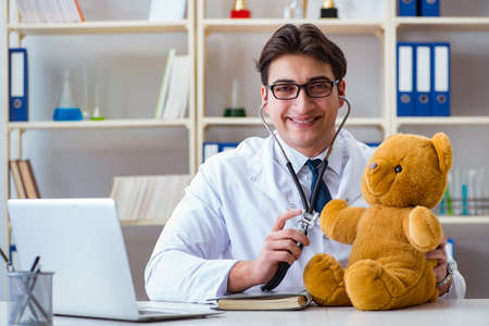 Doctor veterinary pediatrician holding an examination in the offの写真素材