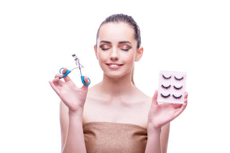 Woman in beauty concept applying make up using cosmetics