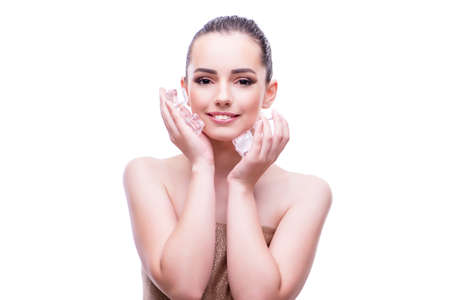 Woman in beauty concept applying make up using cosmeticsの写真素材