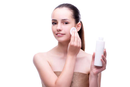 Woman in beauty concept applying make up using cosmeticsの写真素材