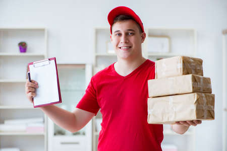 Post man delivering a parcel package