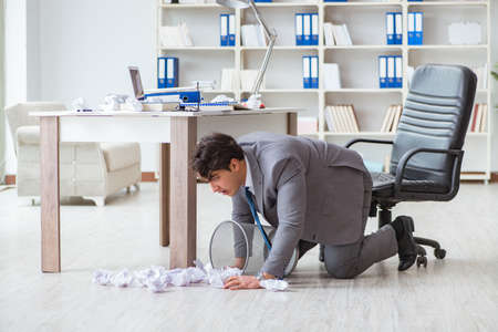 Angry businessman shocked working in the office fired sackedの写真素材