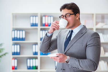 Young businessman working in the officeの写真素材