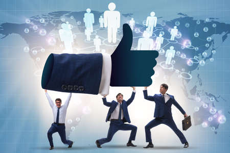 Businessmen supporting thumbs up gesture