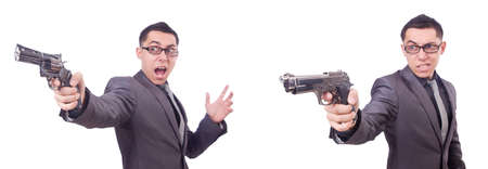 Funny businessman with gun on whiteの写真素材