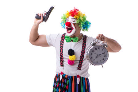 Funny clown with an alarm clock isolated on white backgroundの写真素材