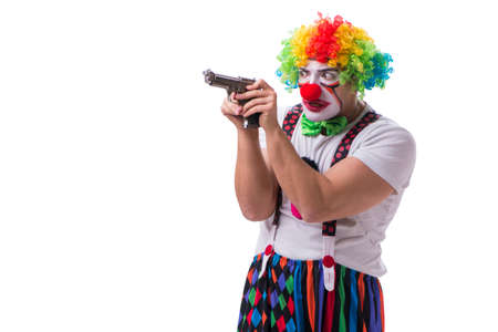 Funny clown with a gun pistol isolated on white backgroundの写真素材