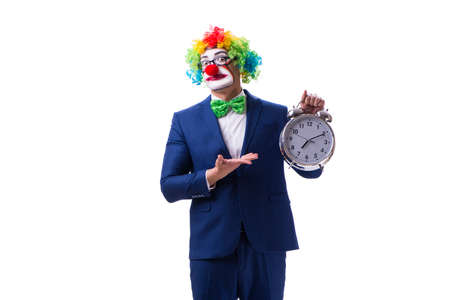 Funny clown businessman with an alarm clock isolated on white baの写真素材