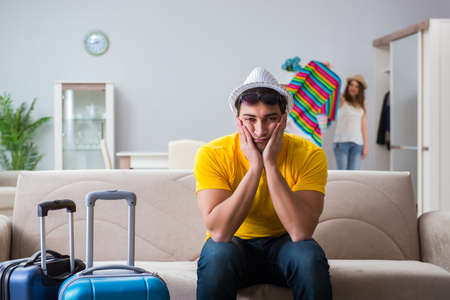 Young family preparing for travel vacationの写真素材
