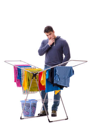 Husband man doing laundry isolated on whiteの写真素材