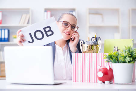 Businesswoman resigning from her jobの写真素材