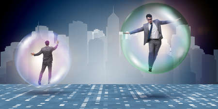 Businessman flying inside the bubbleの写真素材