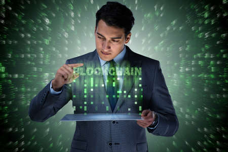 Businessman in blockchain cryptocurrency conceptの写真素材