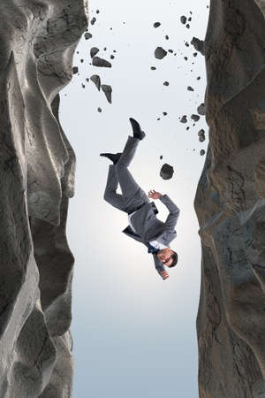 Businessman overcoming challenges in business conceptの写真素材