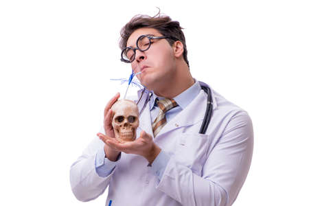 Funny doctor with skull isolated on whiteの写真素材