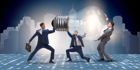Businessmen in bright idea concept