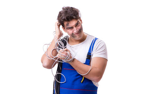 Funny man doing electrical repairの写真素材