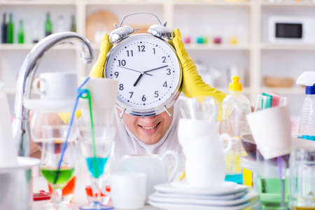 Man failing to meet the deadlines of housekeeping jobの写真素材