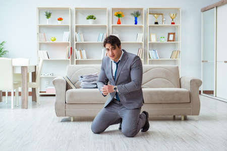 Drunk businessman celebrating in the officeの写真素材