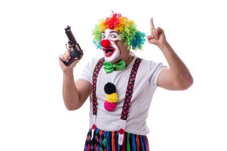 Funny clown with a gun pistol isolated on white backgroundの写真素材