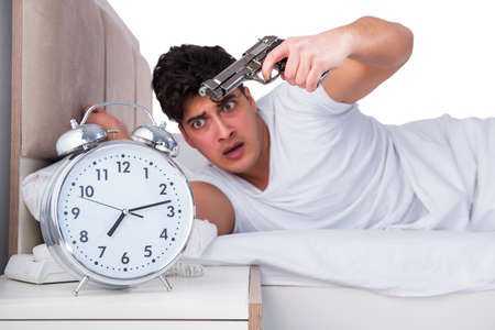 Man in bed suffering from insomniaの写真素材