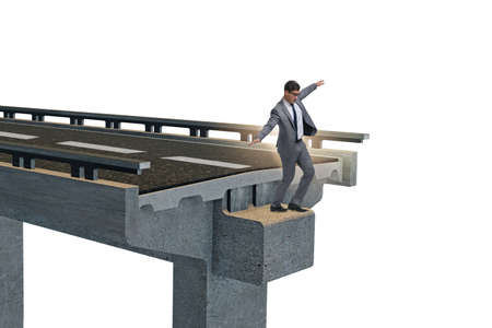 Young businessman with broken bridge isolated on white
