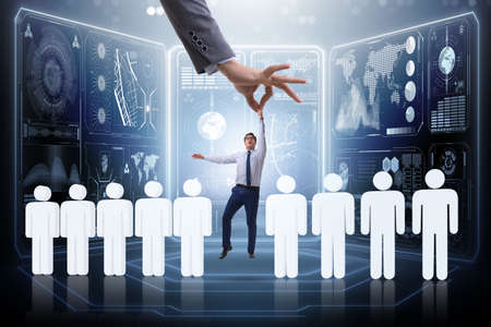 Recruitment concept with hand picking the best employeeの写真素材