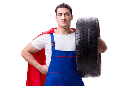 Superhero man with tyre isolated white backgroundの写真素材