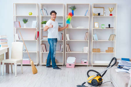 Man doing cleaning at homeの写真素材