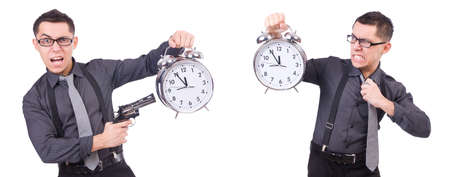 Funny businessman with clock and gunの写真素材