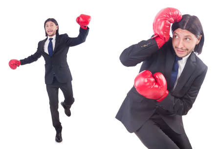 Businessman with boxing gloves on whiteの写真素材
