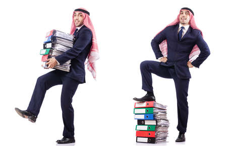 Arab businessman with many folders on whiteの写真素材