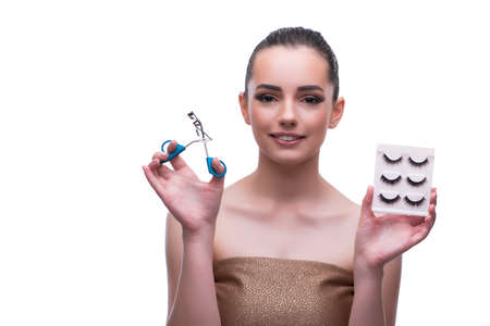 Woman in beauty concept applying make up using cosmetics