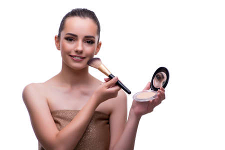 Woman in beauty concept applying make up using cosmeticsの写真素材