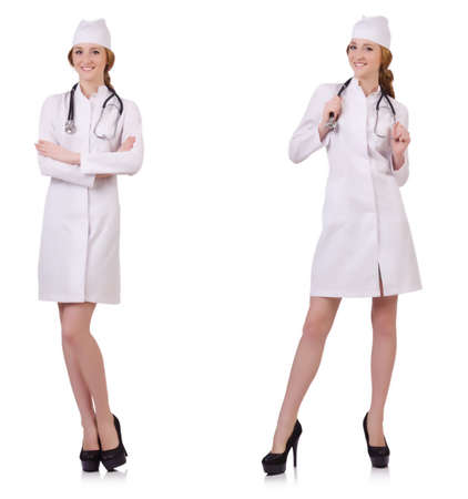 Attractive woman doctor  with stetothcope isolated on whiteの写真素材