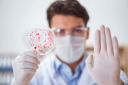 Male doctor working in the lab on virus vaccine