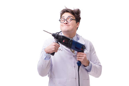 Funny doctor with drill isolated on whiteの写真素材