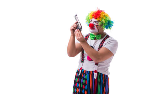 Funny clown with a gun pistol isolated on white backgroundの写真素材