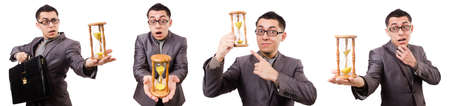 Young man holding briefcase and sandglass isolated on whiteの写真素材