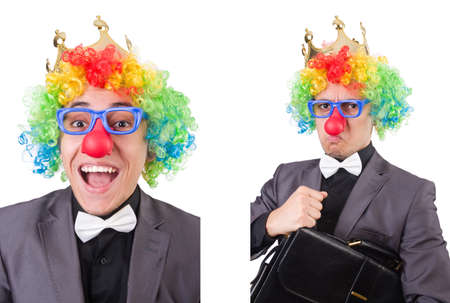 Businessman with crown isolated on whiteの写真素材