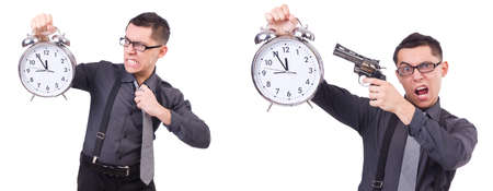 Funny businessman with clock and gunの写真素材