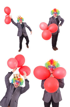 Businessman with crown isolated on whiteの写真素材