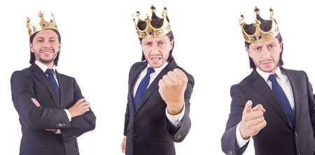 Businessman with crown isolated on whiteの写真素材